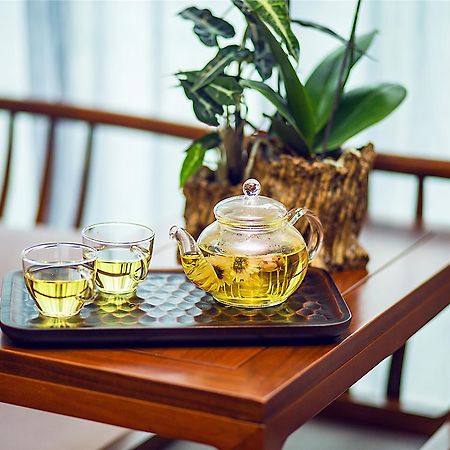 Blossom Tao Hotel（Hangzhou Olympic Center） Экстерьер фото