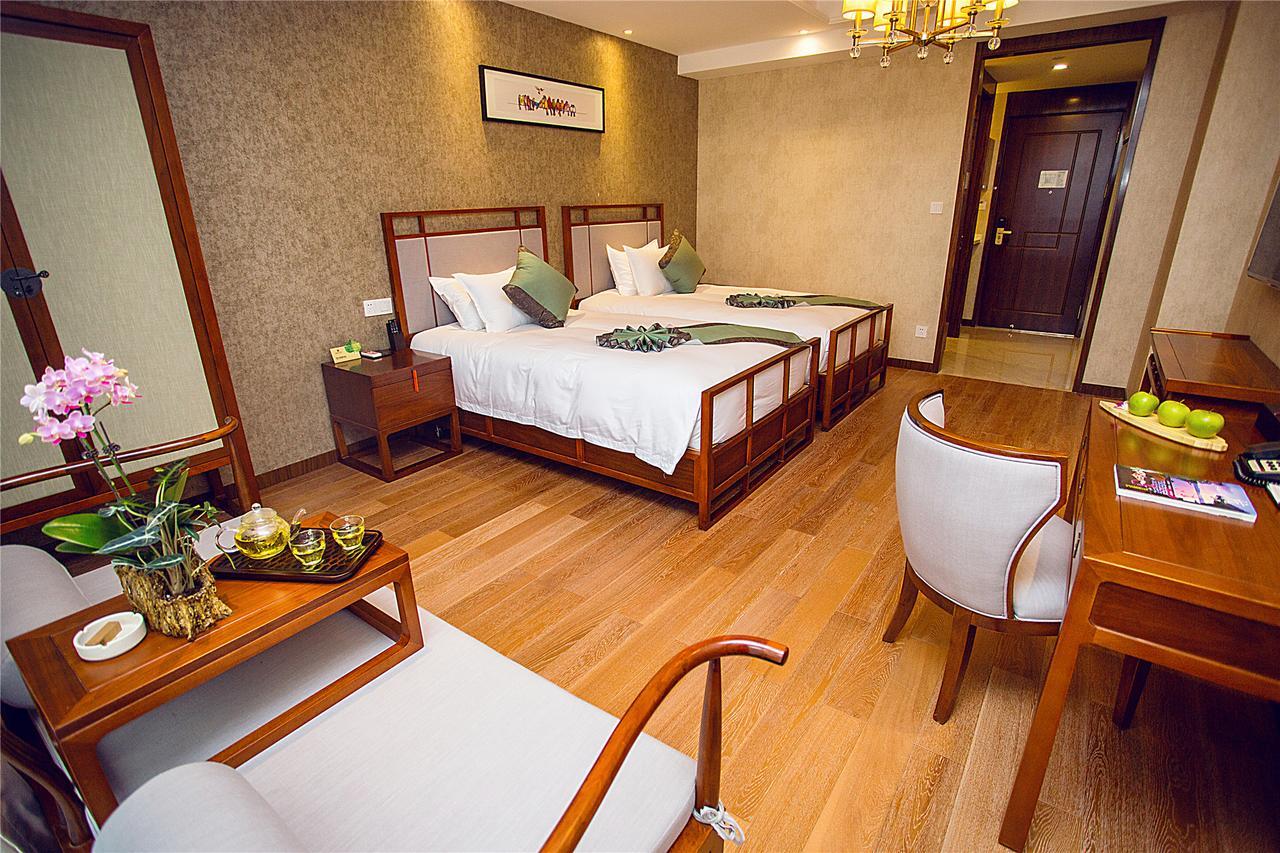 Blossom Tao Hotel（Hangzhou Olympic Center） Экстерьер фото