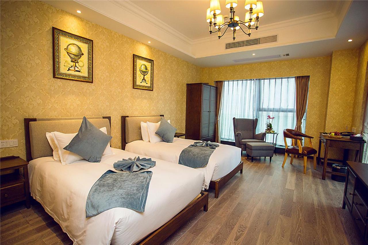 Blossom Tao Hotel（Hangzhou Olympic Center） Номер фото