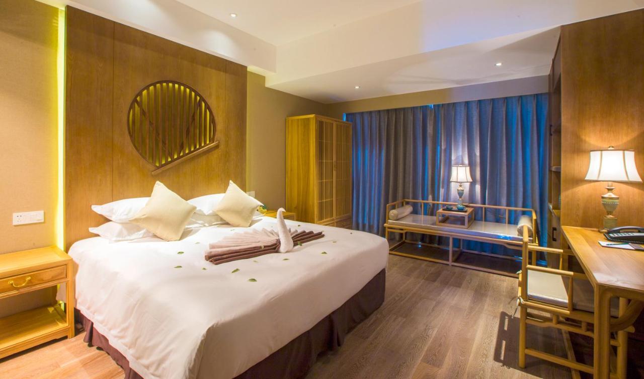 Blossom Tao Hotel（Hangzhou Olympic Center） Номер фото
