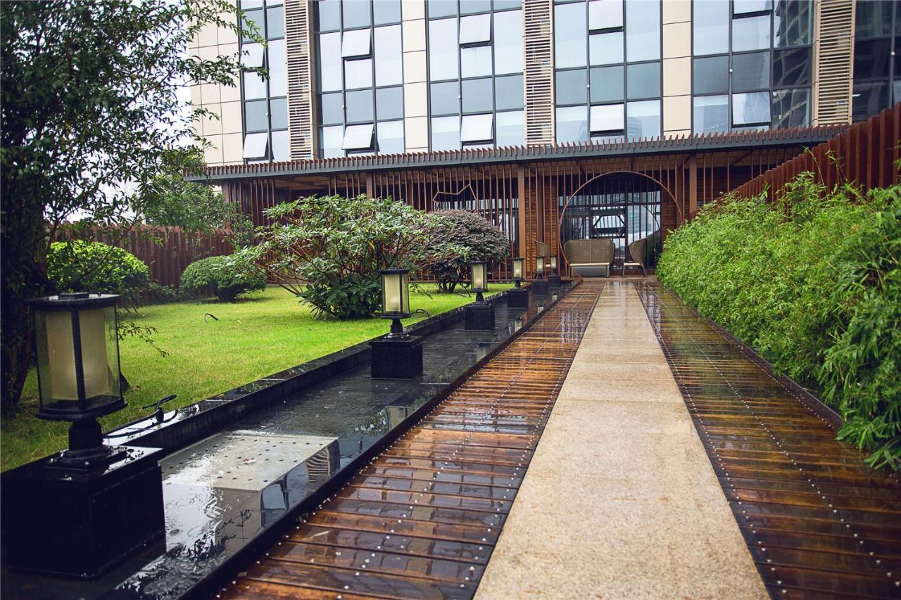 Blossom Tao Hotel（Hangzhou Olympic Center） Номер фото