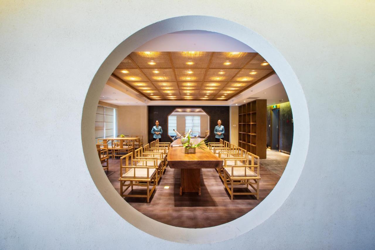 Blossom Tao Hotel（Hangzhou Olympic Center） Номер фото