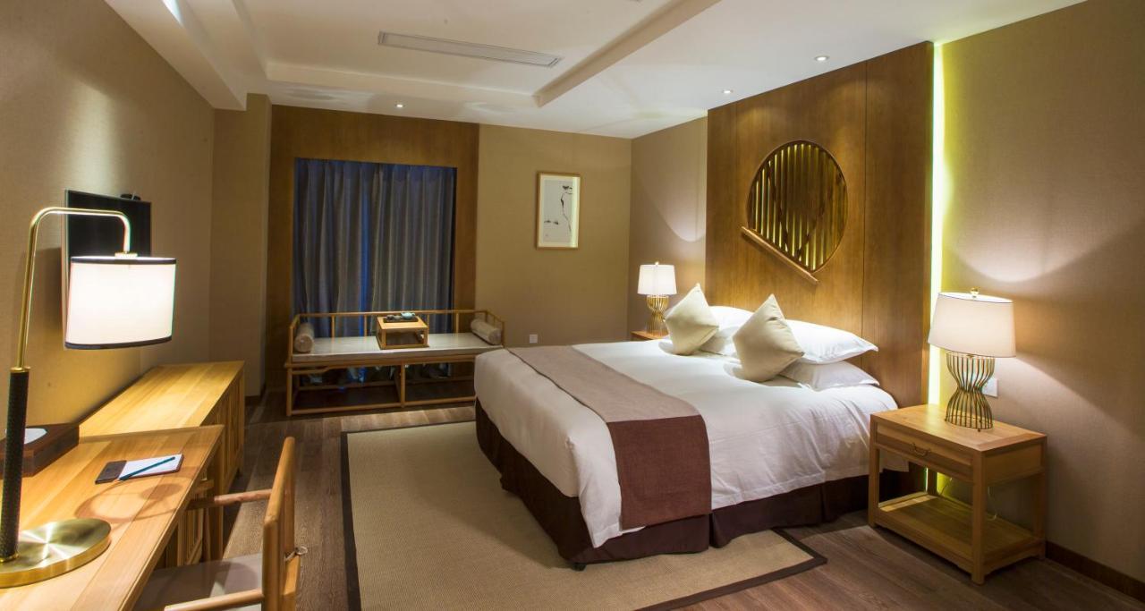 Blossom Tao Hotel（Hangzhou Olympic Center） Номер фото