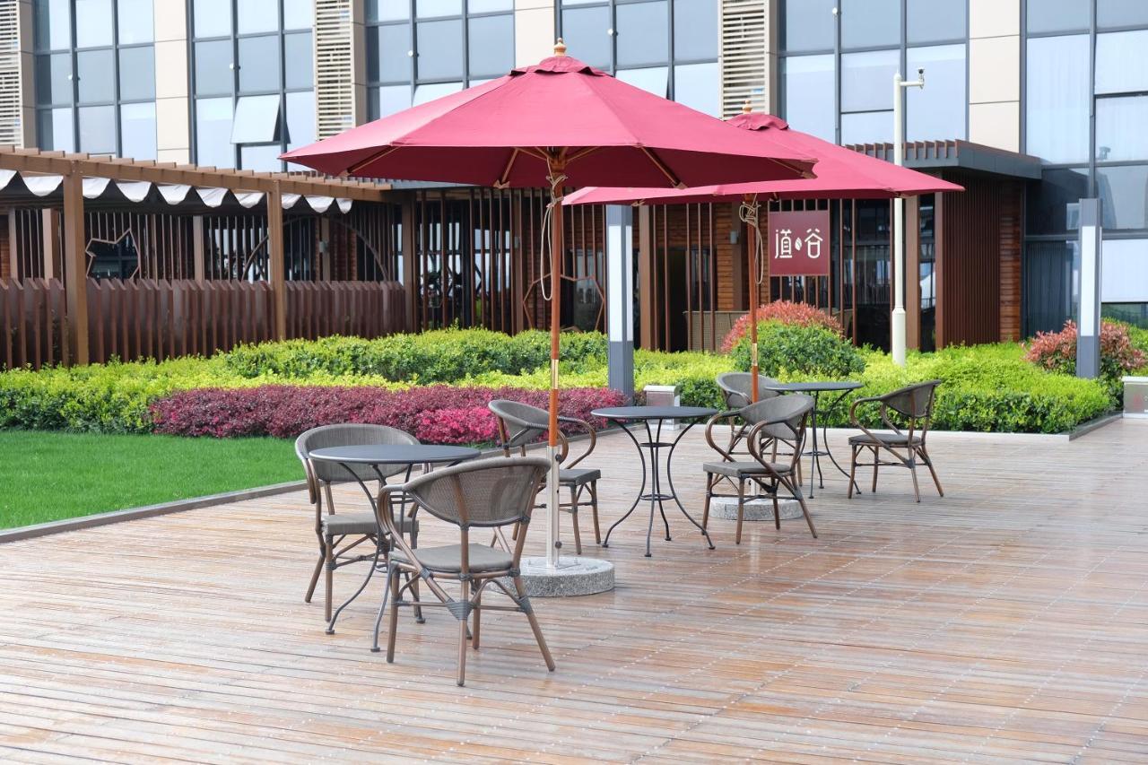 Blossom Tao Hotel（Hangzhou Olympic Center） Номер фото
