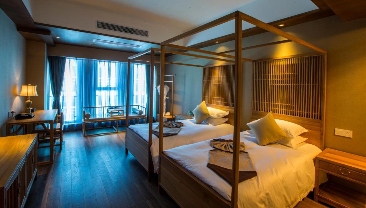 Blossom Tao Hotel（Hangzhou Olympic Center） Номер фото